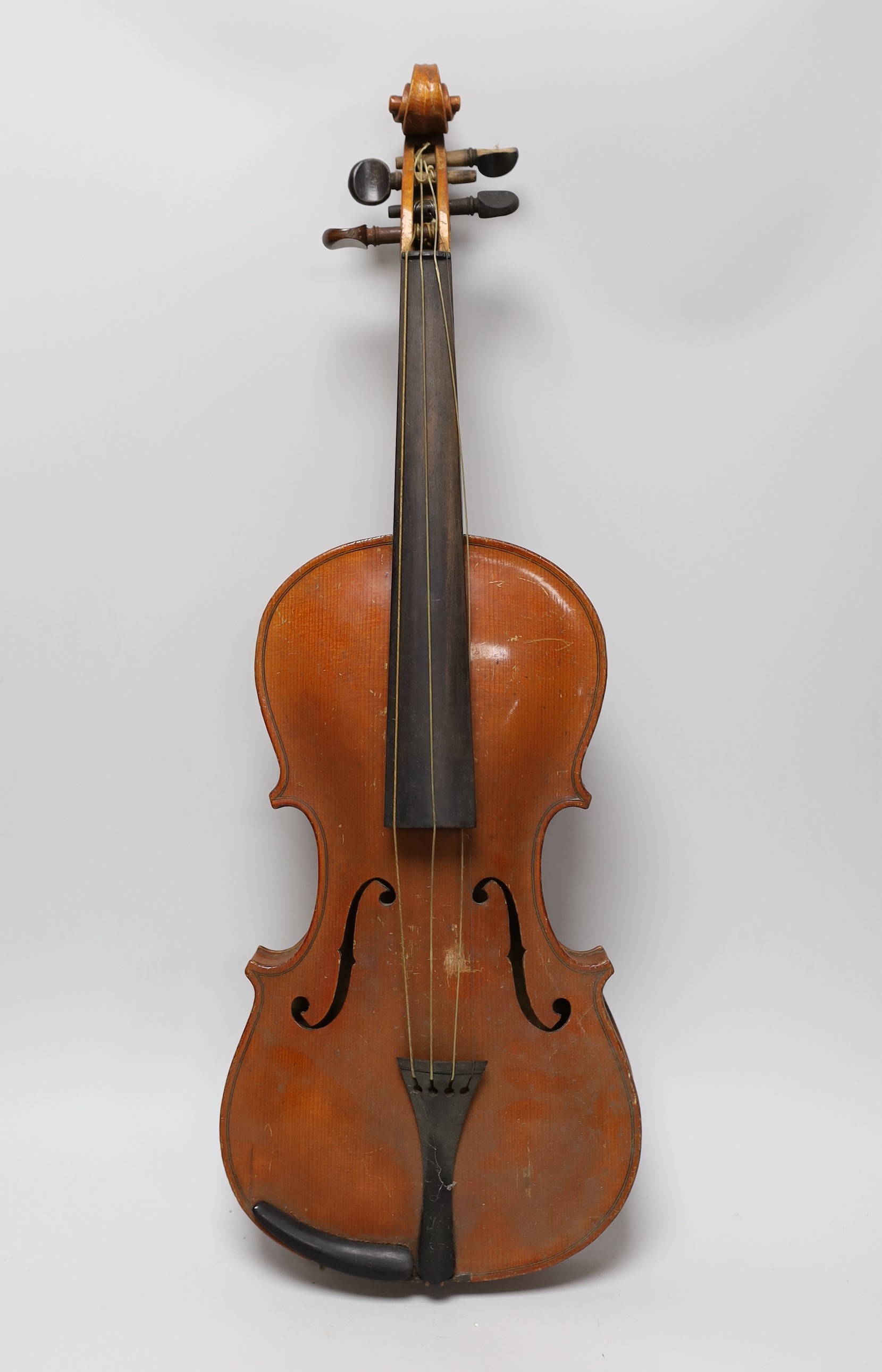 An early 20th century Stainer violin, patent number 23140, back measures 36.5cm excl button. cased